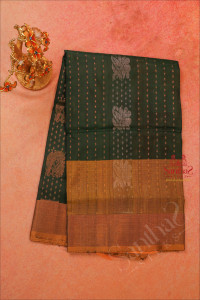 green-colour-body-with-golden-zari-butta-with-contrast-blouse-border