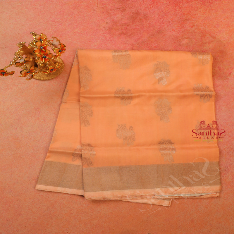 LIGHT PEACH COLOUR BODY WITH SILVER ZARI PEACOCK BUTTA WITH SELF BLOUSE