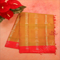double-shade-mustard-colour-body-with-silver-zari-floral-and-leaf-butta-with-contrast-blouse-border