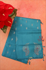 BOREDERLESS BLUE COLOUR BODY WITH SILVER ZARI PEACOCK BUTTA WITH SELF BLOUSE