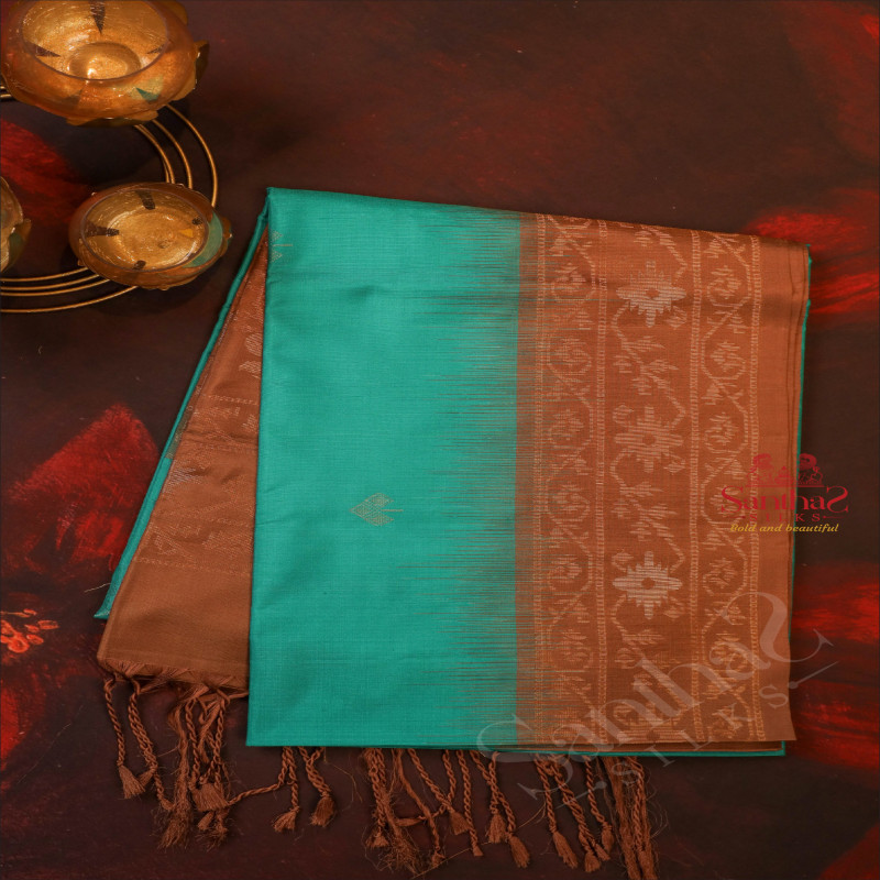 TEAL BLUE COLOUR BODY WITH GOLDEN ZARI LEAF BUTTA WITH CONTRAST BLOUSE & BORDER
