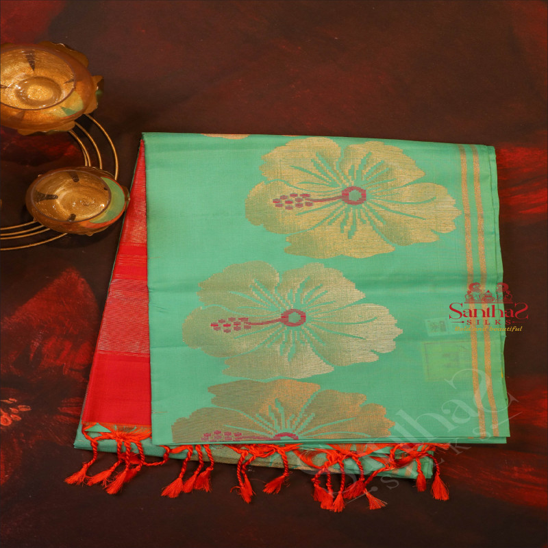 TORQUOISE BLUE COLOUR BODY WITH GOLDEN ZARI FANCY BUTTA WITH CONTRAST BLOUSE & BORDER