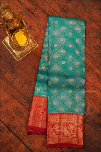 blue-green-colour-body-with-silver-golden-zari-annam-motifs-and-contrast-pallu-blouse