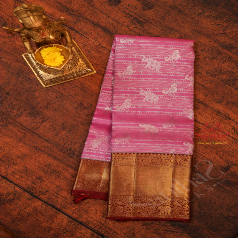 ROSEMILK COLOUR BODY WITH SILVER ZARI ANNAM & ELEPHANT MOTIFS AND CONTARST PALLU & BLOUSE