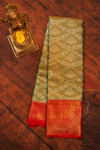 green-and-gold-colour-mixed-body-with-silver-golden-zari-fancy-buttas-and-contrast-pallu-blouse