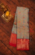 SKY BLUE COLOUR BODY WITH GOLDEN JACQUARD EMBOSED WITH CONTRAST BLOUSE & BORDER