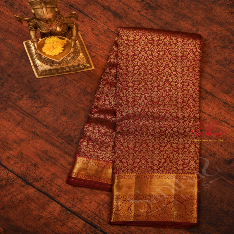 MAROON COLOUR BODY WITH GOLDEN FLORAL BUTTA WITH SELF BLOUSE & BORDER