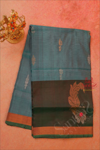 dual-shade-blue-colour-body-with-golden-zari-butta-with-contrast-blouse-border