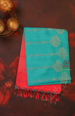 TURQUOISE BLUE COLOUR BODY WITH SILVER ZARI FLORAL BUTTA WITH CONTRAST BLOUSE & BORDER