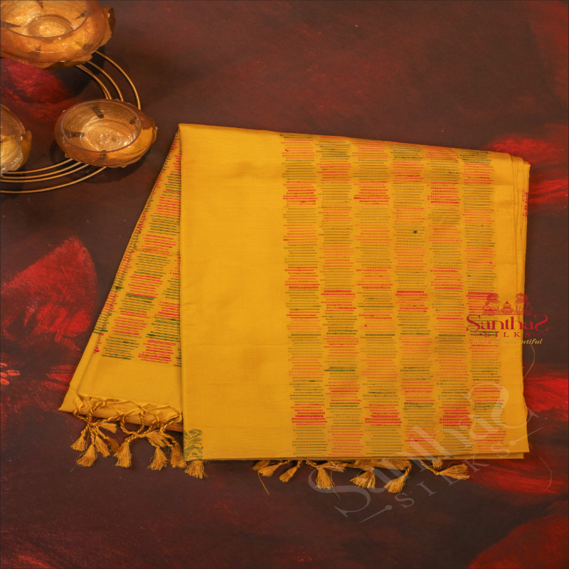 AMBER YELLOW COLOUR BODY WITH GREEN COLOUR THREAD ANNAM MOTIFS AND SELF COLOUR BLOUSE & PALLU