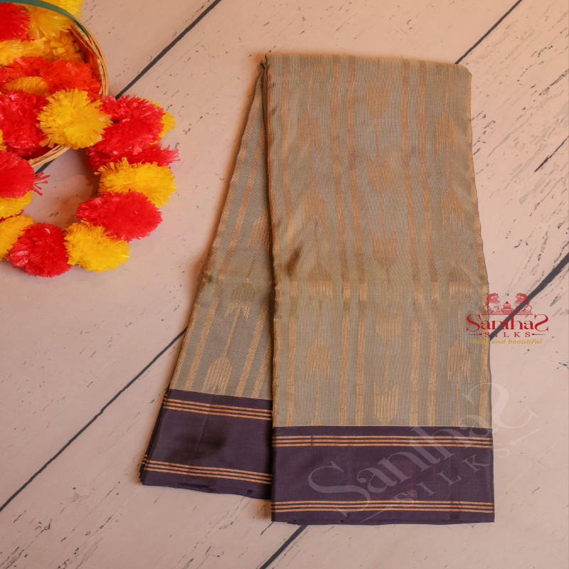 GREY COLOUR BODY WITH GOLDEN ZARI STRIPS WITH CONTRAST BLOUSE & BORDER