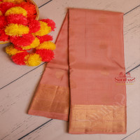 pastel-peach-colour-body-with-golden-zari-butta-with-self-blouse
