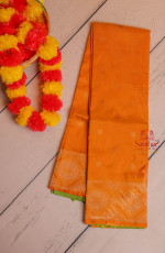 BORDERLESS YELLOW COLOUR BODY WITH GOLDEN ZARI BUTTA WITH CONTRAST BLOUSE