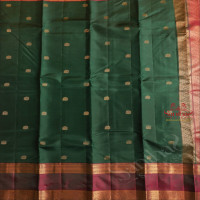 BOTTLE GREEN COLOUR BODY WITH GOLDEN ZARI FLORAL BUTTA WITH CONTRAST BLOUSE & BORDER