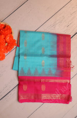 SKY BLUE COLOUR BODY WITH GOLDEN ZARI BUTTA WITH CONTRAST BLOUSE & BORDER
