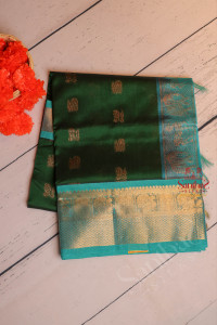 bottle-green-colour-body-with-golden-zari-annam-butta-with-contrast-blouse-border