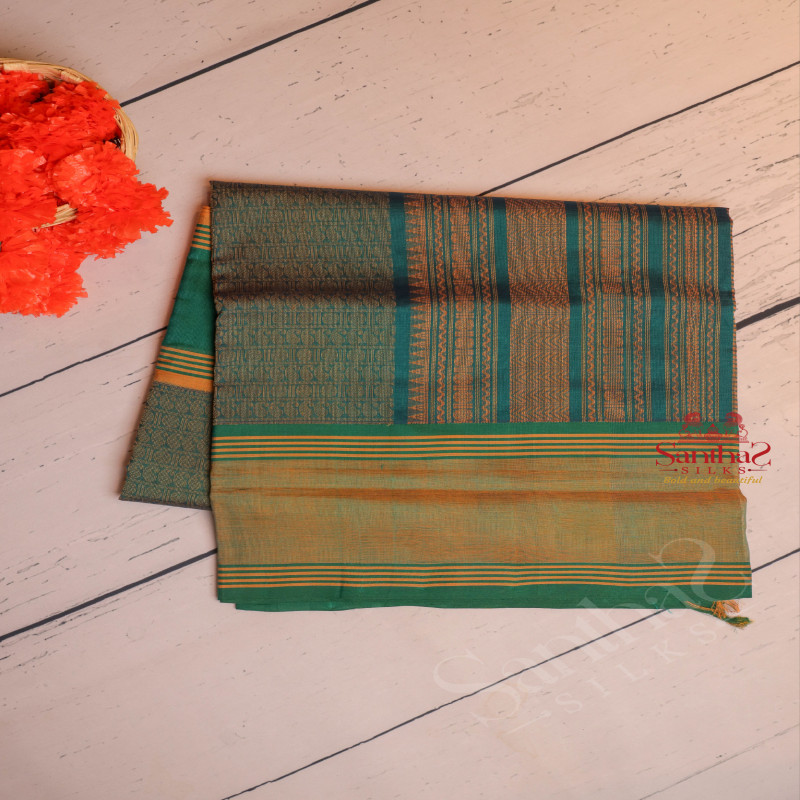 PEACOCK GREEN COLOUR BODY WITH THREAD MOTIF WITH SELF BLOUSE