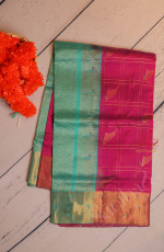 RED VIOLET COLOUR CHECKED BODY WITH GOLDEN ZARI PARROT BUTTA WITH CONTRAST BLOUSE & BORDER