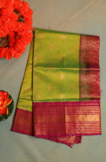 GREEN COLOUR BODY WITH GOLDEN ZARI ANNAM CHAKKARAM BUTTA WITH CONTRAST BLOUSE & BORDER