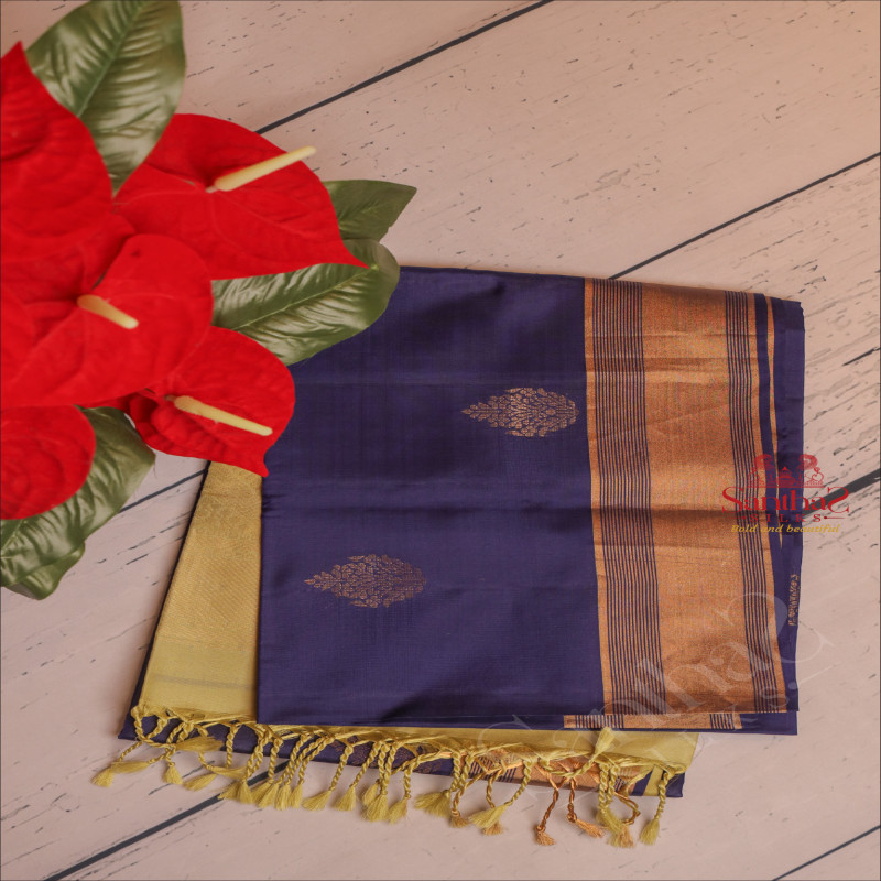 PEPSI BLUE COLOUR BODY WITH GOLDEN ZARI BUTTA WITH CONTRAST BLOUSE & BORDER