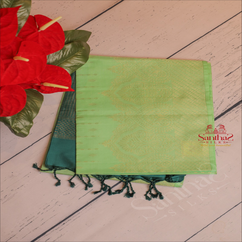 CELADON GREEN COLOUR BODY WITH GOLDEN ZARI STRIPS WITH CONTRAST BLOUSE & BORDER