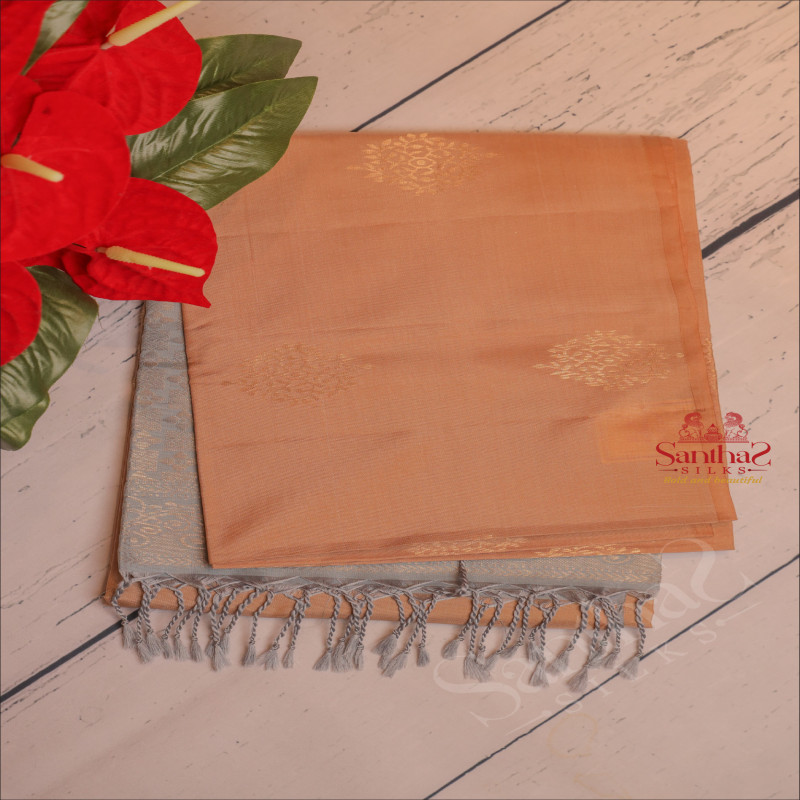 CAMEL BROWN COLOUR BODY WITH GOLDEN ZARI BUTTA WITH CONTRAST BLOUSE & BORDER
