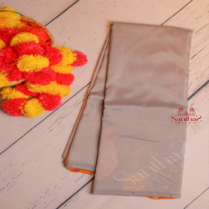 BORDERLES BLUE GREY COLOUR BODY WITH GOLDEN ZARI MANGO BUTTA WITH CONTRAST BLOUSE