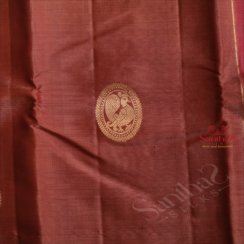 ROSY BROWN COLOUR BODY WITH GOLDEN ZARI PEACOCK MOTIFS IN CHAKRA AND CONTRAST PALLU & BLOUSE