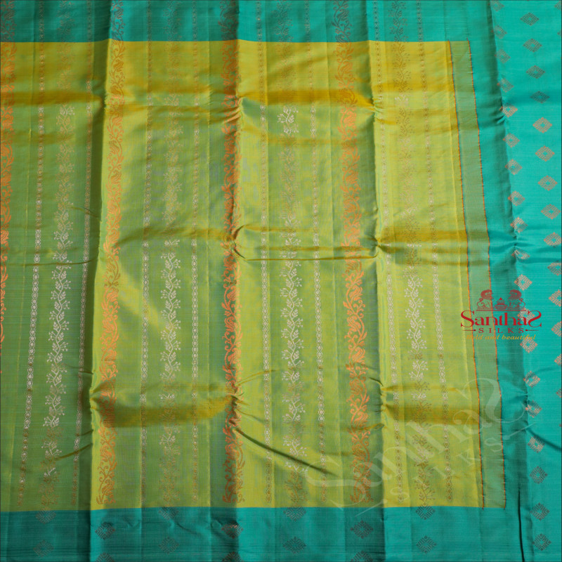 GREEN COLOUR BODY WITH COPPER & SILVER ZARI BUTTAS AND CONTRAST PALLU & BLOUSE