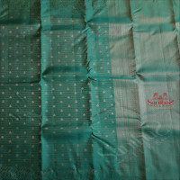 BORDERLESS DARK TEAL BLUE COLOUR BODY WITH ZARI EMBOSED WITH SELF BLOUSE