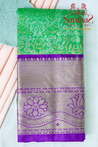 green-colour-body-in-floral-pattern-with-contrast-blouse-border