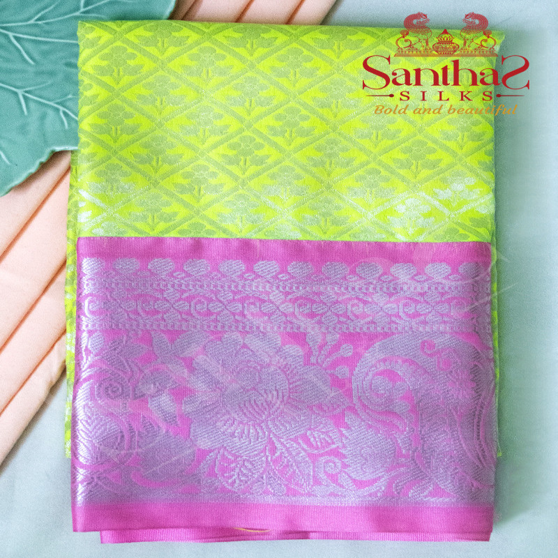 FLOURESCENT GREEN BODY IN FLORAL PATTERN WITH CONTRAST BLOUSE &  BORDER