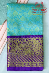 ramar-blue-body-in-floral-pattern-with-contrast-blouse-border