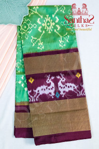 green-colour-body-in-ikkat-print-with-contrast-blouse-border