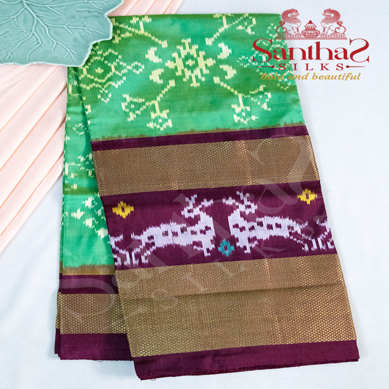 GREEN COLOUR BODY IN IKKAT PRINT WITH CONTRAST BLOUSE & BORDER