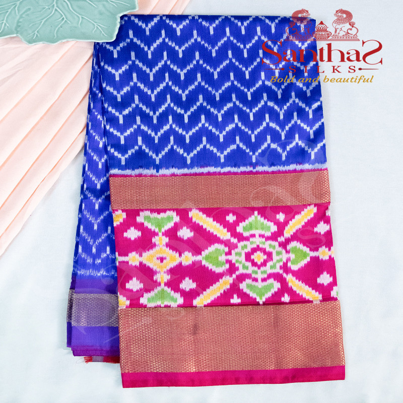 ROYAL BLUE BODY IN IKKAT PRINT WITH CONTRAST BLOUSE & BORDER