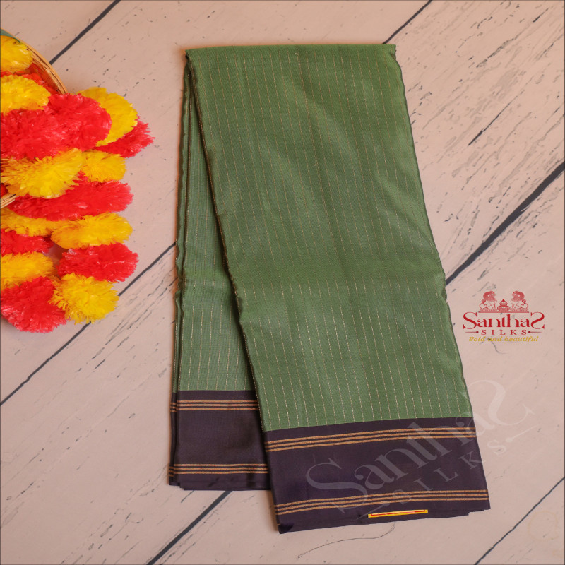 OLIVE GREEN COLOUR BODY WITH GOLDEN ZARI STRIPS WITH CONTRAST BLOUSE & BORDER