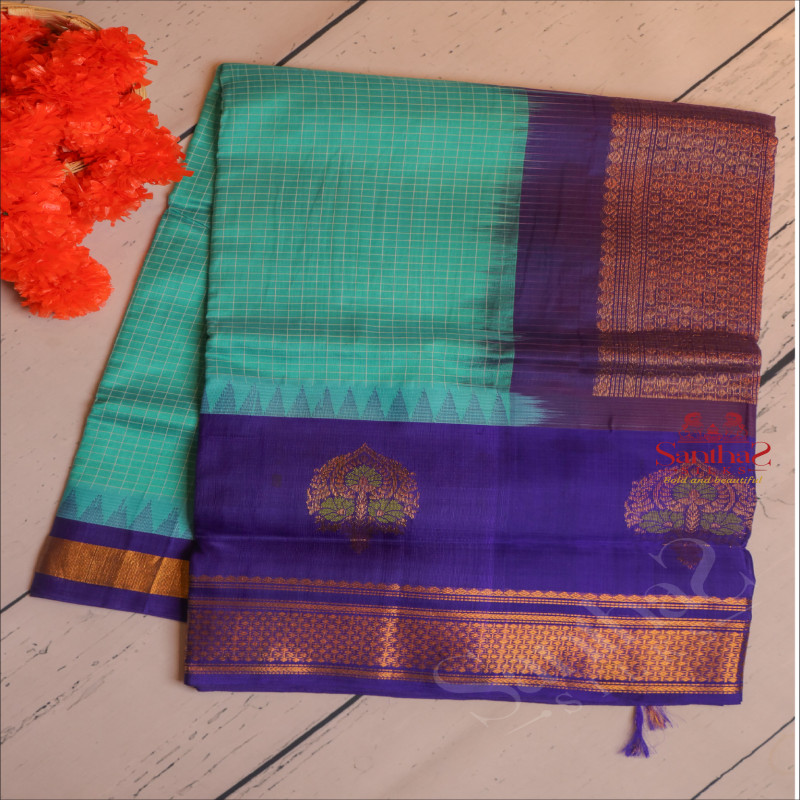 TURQUOISE BLUE COLOUR CHECKED BODY WITH CONTRAST BLOUSE & BORDER