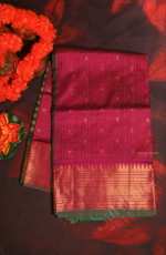 MAGENTA COLOUR BODY WITH GOLDEN STRIPS AND BUTTA WITH CONTRAST BLOUSE & BORDER