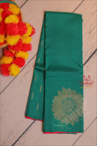 borderless-green-colour-body-with-golden-zari-big-floral-butta-with-contrast-blouse
