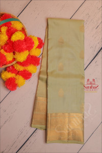 dark-sea-green-colour-body-with-golden-zari-butta-with-self-blouse