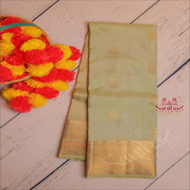 DARK SEA GREEN COLOUR BODY WITH GOLDEN ZARI BUTTA WITH SELF BLOUSE