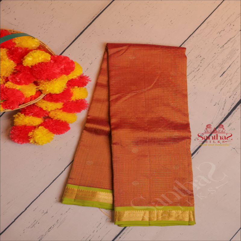 RUST ORANGE COLOUR CHECKED BODY WITH GOLDEN ZARI BUTTA WITH CONTRAST BLOUSE & BORDER