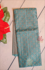 METALIC TEAL BLUE TUSSAR SAREE BODY WITH COPPER ZARI BUTTAS AND SELF COLOUR PALLU & BLOUSE