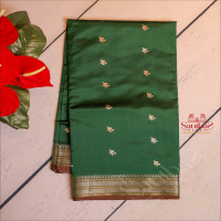 green-colour-banarasi-saree-with-golden-and-siver-zari-floral-butta-with-contrast-blouse-border