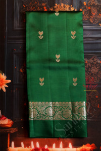 raw-mango-saree-in-bottle-green-colour-with-zari-butta-with-contrast-blouse