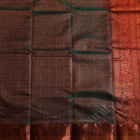 PEACOCK BLUE COLOUR BODY WITH JACQUARD FLORAL EMBOSED WITH CONTRAST BLOUSE & BORDER