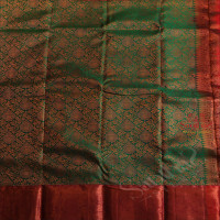 GREEN COLOUR BODY WITH JACQUARD FLORAL EMBOSED WITH CONTRAST BLOUSE & BORDER