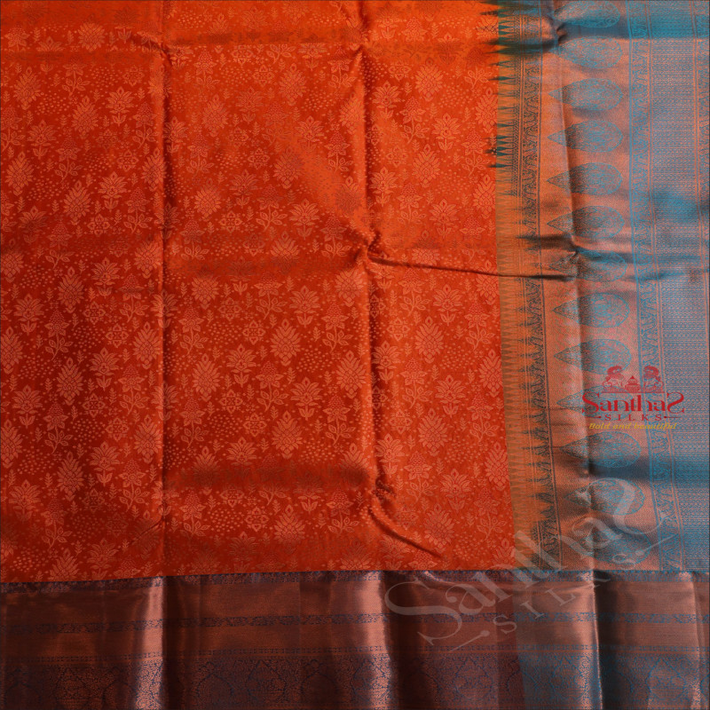 ORANGE COLOUR BODY WITH JACQUARD FLORAL EMBOSED WITH CONTRAST BLOUSE & BORDER