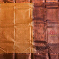 SANDAL COLOUR BODY WITH JACQUARD FLORAL EMBOSED IN COPPER ZARI WITH CONTRAST BLOUSE & BORDER